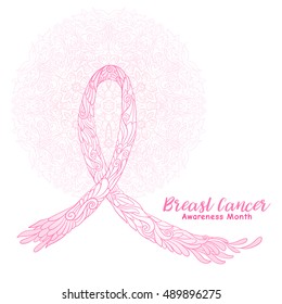 Breast cancer awareness month decorative pink ribbon on decorative mandala background. Stock line vector illustration.