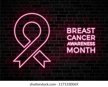 breast cancer awareness month neon signs on dark brick wall for greeting cards, posters, invitations, brochures