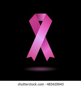Breast cancer awareness pink ribbon on black background.