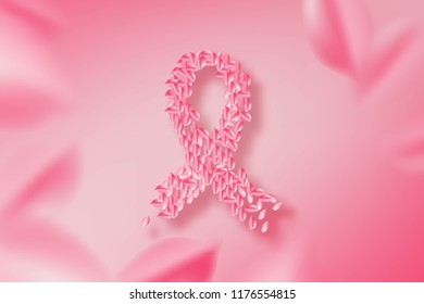 Breast cancer awareness ribbon made from petal rose on petal background