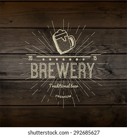 Brewery badges logos and labels for any use, logo templates and design elements for beer house, bar, pub, brewing company, brewery, tavern, restaurant, on wooden background texture