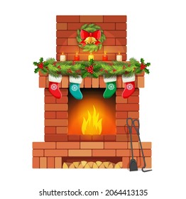 Brick Christmas fireplace with holly leaf bells and Christmas stockings, candles, wreath. House classic fireplace with burning wooden chunks flames and winter holidays traditional decorations