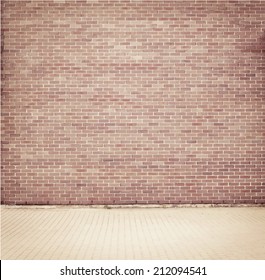 Brick grunge weathered brown wall background with walkway