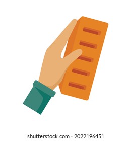 Brick in hand icon. Flat illustration of brick in hand vector icon isolated on white background
