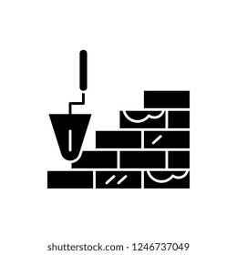 Brick laying black icon, vector sign on isolated background. Brick laying concept symbol, illustration 