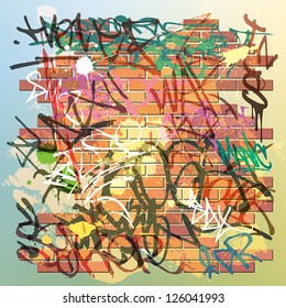 A Brick Wall with lots of Graffiti