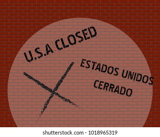 A Brick Wall With Spotlight Separating the U.S.A and Mexico 