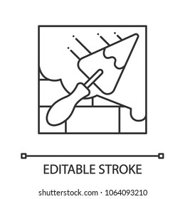Brick wall with triangular shovel linear icon. Putty knife, spatula. Thin line illustration. Cement solution. Contour symbol. Vector isolated outline drawing. Editable stroke