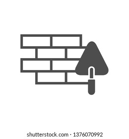 brick wall and trowel vector icon isolated on white background. brick wall and trowel flat icon for web, mobile and user interface design