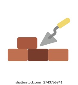 A brick wall under construction with a trowel