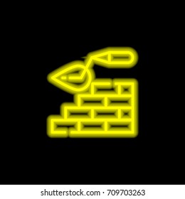 Brickwall yellow glowing neon ui ux icon. Glowing sign logo vector