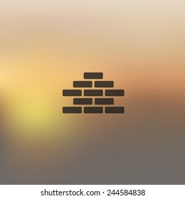 brickwork icon on blurred background