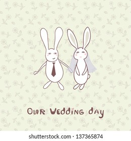 Bridal shower invitation with two cute rabbits in bride and groom costumes