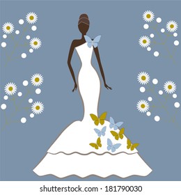 Bride in a beautiful dress with butterfly against a floral background