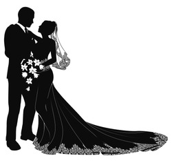 A Bride And Groom On Their Wedding Day About To Kiss In Silhouette