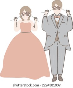 Bride and groom posing while holding flowers