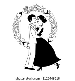 bride and groom and their first dance wedding day wreath flowers