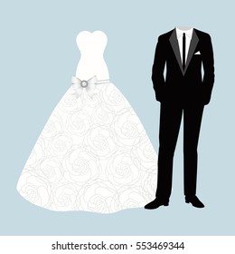 Bride and groom. Wedding card with bride and groom clothes. Beautiful wedding dress and suit.