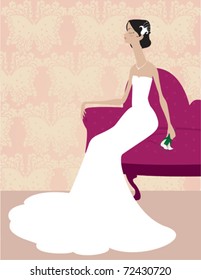 A bride sitting in her wedding gown.