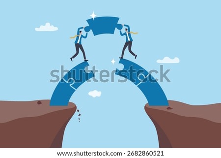 Bridging the gap connect the path to success together, teamwork or partnership, collaboration or cooperation for winning challenge, businessman connect jigsaw puzzle as the bridge to connect the gap.