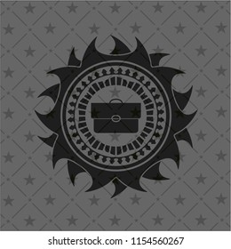 briefcase icon inside black emblem