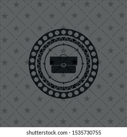 briefcase icon inside black emblem