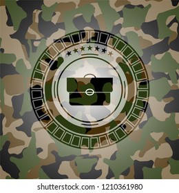 briefcase icon inside camo emblem