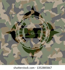briefcase icon inside camouflage emblem