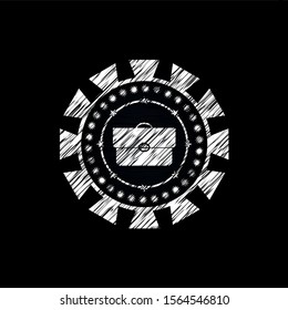 briefcase icon inside chalkboard emblem on black board