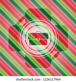 briefcase icon inside christmas colors emblem.