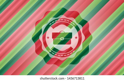 briefcase icon inside christmas style emblem.
