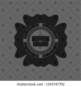 briefcase icon inside dark emblem