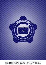 briefcase icon inside emblem with jean background
