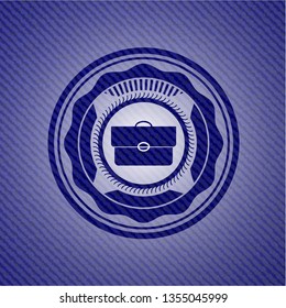 briefcase icon inside emblem with jean texture