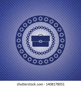 briefcase icon inside emblem with jean high quality background