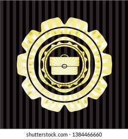 briefcase icon inside gold shiny emblem