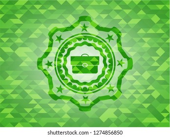 briefcase icon inside green emblem with mosaic background