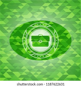 briefcase icon inside green mosaic emblem