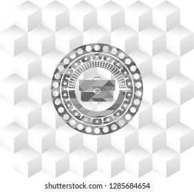 briefcase icon inside grey emblem with cube white background