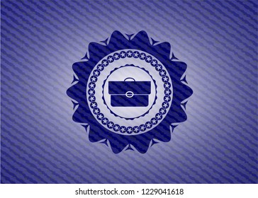briefcase icon inside jean background