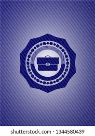 briefcase icon inside jean background