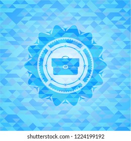 briefcase icon inside light blue emblem with triangle mosaic background