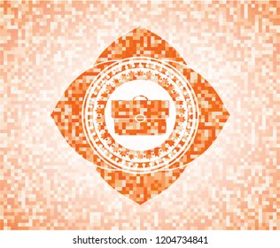 briefcase icon inside orange mosaic emblem