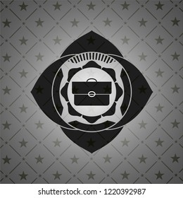 briefcase icon inside realistic dark emblem