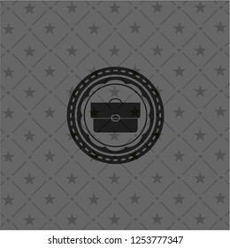 briefcase icon inside realistic dark emblem