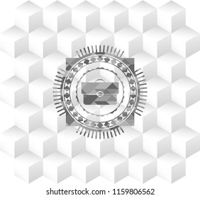 briefcase icon inside realistic grey emblem with cube white background