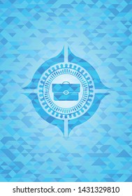 briefcase icon inside realistic light blue mosaic emblem