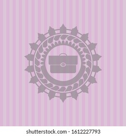 briefcase icon inside retro pink emblem