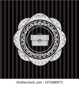 briefcase icon inside silvery badge or emblem