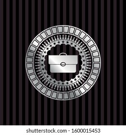 briefcase icon inside silvery badge or emblem